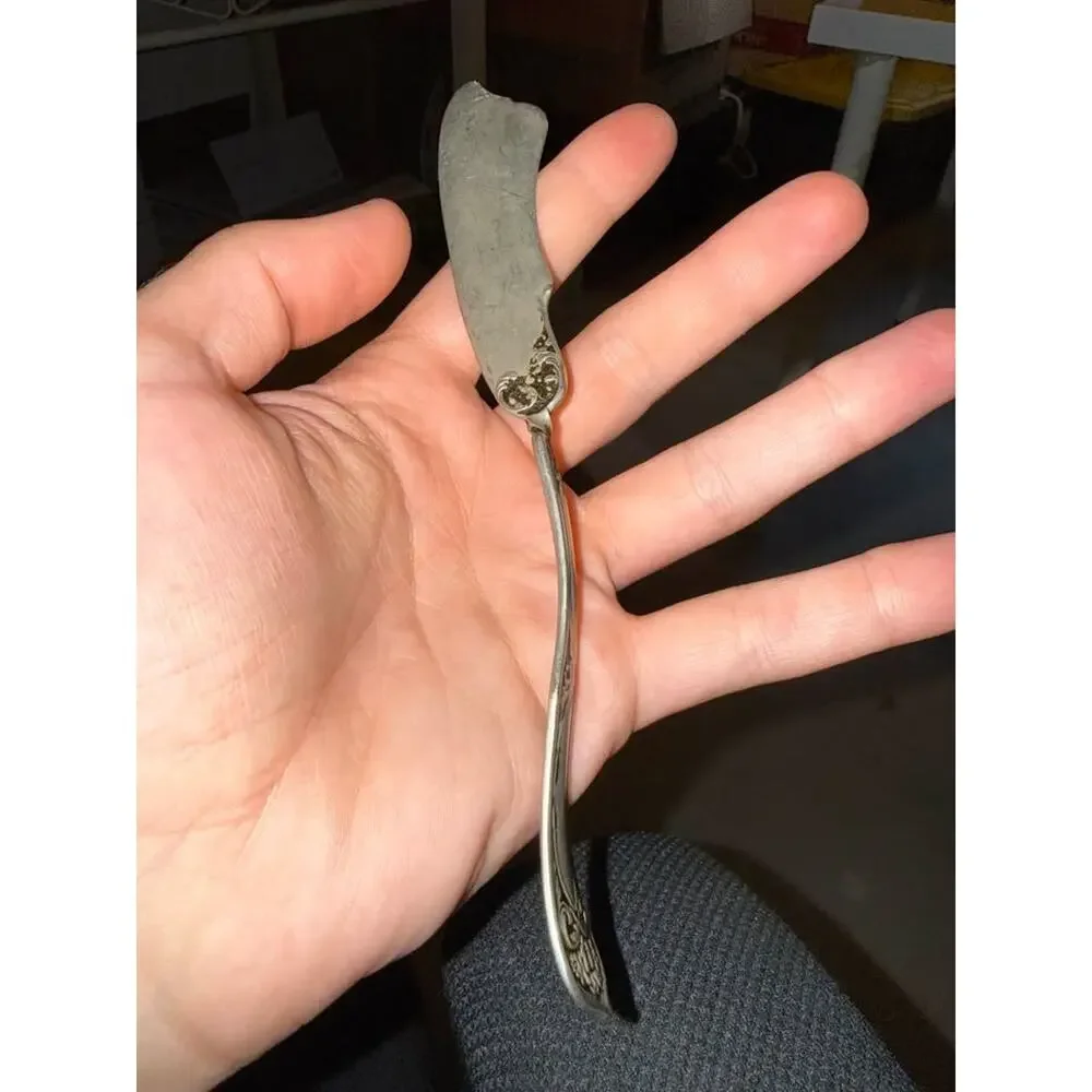 Antique Wm. Rogers Silverplate Twisted Butter Knife